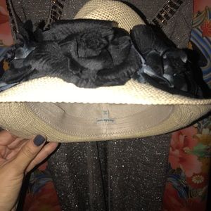Flower Beige hat with black flowers. $4.95 to ship